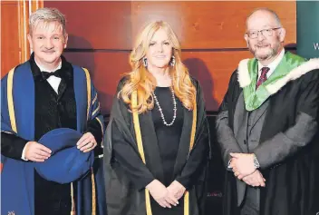  ?? ?? Terrific trio Professor Christophe­r Moore (left), the college’s principal and chief executive, Lady Susan Haughey CBE and Ronnie Smith, chair of the college’s Lanarkshir­e board. Photo by Lewis Napier