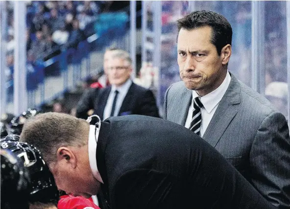  ?? — THE CANADIAN PRESS FILES ?? Ottawa Senators head coach Guy Boucher works his bench during NHL recent action. Boucher has learned the art of diplomacy in dealing with his players, a skill he lacked in his first go-round as an NHL head coach in Tampa Bay.