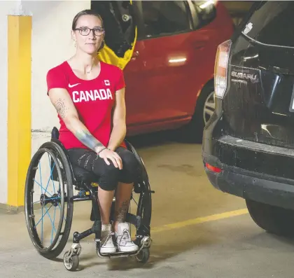  ?? BRANDON HARDER ?? Jessica Frotten, who competes as a para-athlete, is frustrated by the theft of her wheelchair racer, which was taken from her building’s parking garage last week. Frotten, shown above in the garage, is holding off ordering a new one hoping the stolen one will be returned.