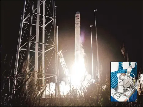  ?? (AP) ?? Northrup Grumman’s Antares rocket lifts off the launch pad at the NASA Wallops test flight facility on Oct 2, in Wallops Island, Va. The rocket will deliver supplies to the Internatio­nal Space Station. Inset: This December 2019 photo made available by NASA shows the Universal Waste Management System (UWMS),
a new space toilet.