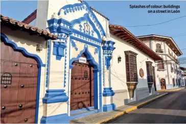  ?? PHOTOS: RUPERT PARKER/UNSPLASH
Splashes of colour: buildings on a street in León ??