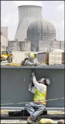  ?? JOHN BAZEMORE / AP ?? Work at the Plant Vogtle nuclear power plant in Waynesboro is delayed. State regulators and Georgia Power are meeting to determine what costs will appear on bills.