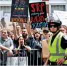  ?? FILE PHOTO BY MICHAEL PATRICK/NEWS SENTINEL ?? Counterpro­testers scream at protesters across the street during a rally that ended peacefully in Ft. Sanders on Saturday.