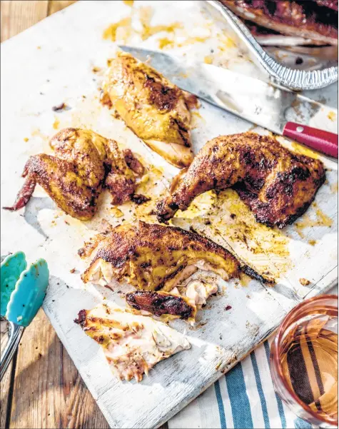  ?? Jerrelle Guy ?? Smoked chicken is featured in “Rodney Scott’s World of BBQ” by James Beard Award winner Rodney Scott and Lolis Eric Elie.