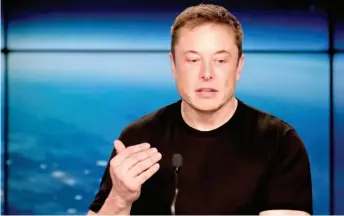  ?? CITIZEN NEWS SERVICE FILE PHOTO ?? SpaceX and Tesla CEO Elon Musk speaks at a news conference in Cape Canaveral, Fla. in February. Tesla is a company of big ideas, but its stock is falling because of much more practical concerns.