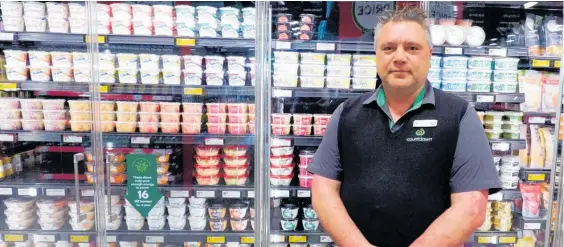  ?? Photo / Milly Fullick ?? Countdown store manager Jess Stubbs prepares to open the new Taupo store.