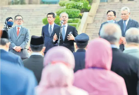  ?? — Bernama photo ?? Muhyiddin delivers his address to JPM civil servants during his first assembly since taking office as Prime Minister.