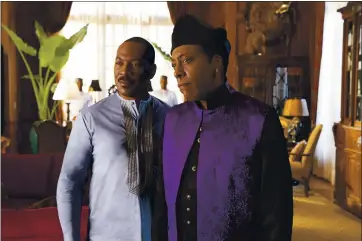  ?? PARAMOUNT PICTURES ?? Eddie Murphy, left, and Arsenio Hall reprise their roles in the entertaini­ng if flawed “Coming 2 America.”