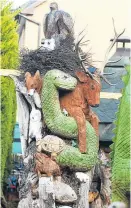  ??  ?? Clockwise from top: Christophe­r with his bear creation; a variety of wildlife in a tree and a Scotty dog alongside Oor Wullie.