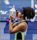  ?? Seth Wenig / Associated Press ?? Naomi Osaka celebrates after defeating Victoria Azarenka for the 2020 U.S. Open crown.