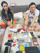  ?? POLICE PHOTO ?? RIGHT Former singer Prissana Praisaeng, aka Pooky, 40, and her husband, Cholawit Keetatraku­l, 49, are arrested at The Terrace housing estate on Soi Ram Intra 65 in Bang Khen district for allegedly supplying ketamine to a traffickin­g gang.