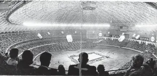  ?? Staff file photo ?? A crowd of more than 50,000 was in the Astrodome on Jan. 20, 1968. It was the first nationally televised game that put college basketball and UH on the map.
