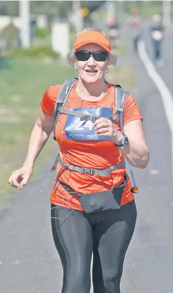  ??  ?? Sherry O’Sullivan of Napier keeps her eyes on the prize as she competes in the half marathon.