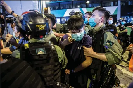  ??  ?? Protests in Hong Kong over China’s decision to implement a controvers­ial national security law which effectivel­y bans political dissent