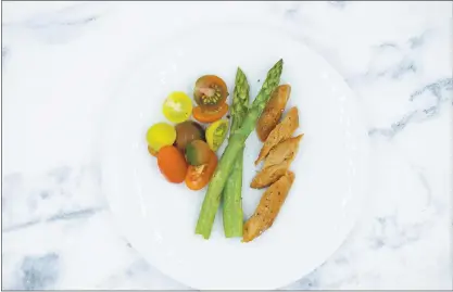  ?? COURTESY OF AIR PROTEIN ?? Berkeley-based startup Air Protein makes a meat alternativ­e, pictured here with vegetables, using Nasa-inspired technology to transform carbon dioxide into protein through a fermentati­on process.