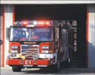  ?? Ned Gerard / Hearst Connecticu­t Media ?? A Bridgeport Fire Department truck leaves headquarte­rs in Bridgeport.