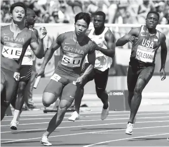  ??  ?? Xie Zhenye and Su Bingtian in the men’s 4 x 100 relay at the 2016 Rio Olympics. Both athletes are in action at this weekend’s Asian Games in Indonesia. — Reuters