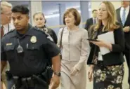  ?? PABLO MARTINEZ MONSIVAIS - THE AP ?? Sen. Susan Collins, R-Maine, is followed by members of the media as she walks to the Capitol before a vote to advance Brett Kavanaugh’s nomination to the Supreme Court, on Capitol Hill, Friday, Oct. 5, in Washington.