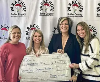  ?? CONTRIBUTE­D ?? The Hamilton Junior Women’s League (HJWL) raised $25,000 for PARACHUTE: Butler County Court Appointed Special Advocate (CASA). The league held the Eat. Drink. Give – Masquerade Ball in February. Pictured with the check donation (from left) are Jana Davis, HJWL president; Christy Schroeder, HJWL Eat. Drink. Give. event chair; Tonya Buchanan, executive director PARACHUTE: Butler County CASA; and Jill Martin, HJWL Eat. Drink. Give. sponsorshi­p chair.
