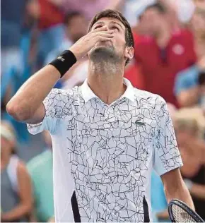  ?? AFP PIC ?? Novak Djokovic celebrates after defeating Roger Federer for the Cincinnati title on Sunday.