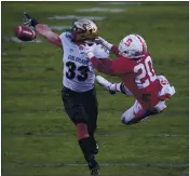  ??  ?? A pass intended for Stanford’s Austin Jones (20) is broken up by Colorado’s Joshua Gustav in the fourth quarter.