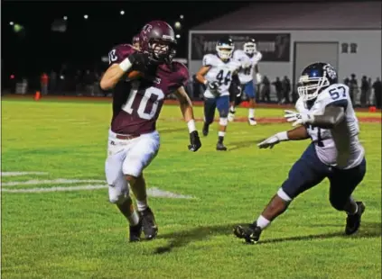  ?? AUSTIN HERTZOG — DIGITAL FIRST MEDIA ?? Pottsgrove’s Bailey Delp (10) returns an intercepti­on deep into Pottstown territory during the first quarter in Week 6. Delp, along with teammate Jimai Springfiel­d, are tied for fourth in the Pioneer Athletic Conference with four intercepti­ons.