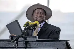  ?? PICTURE: REUTERS ?? BY THE BOOK: President Yoweri Museveni holds the Bible during his swearing-in at the Independan­ce grounds in Uganda’s capital Kampala, yesterday.