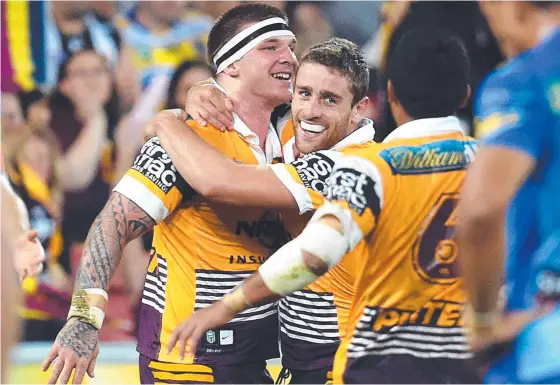  ?? Photo: AAP Image/Dan Peled ?? Josh McGuire (left) will join fellow former Broncos player Andrew McCullough (centre) at the Dragons.