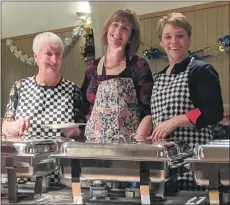  ??  ?? Sheena Ramsay, Judy Semple and Lesley Freeman serving up haggis, neeps and tatties.