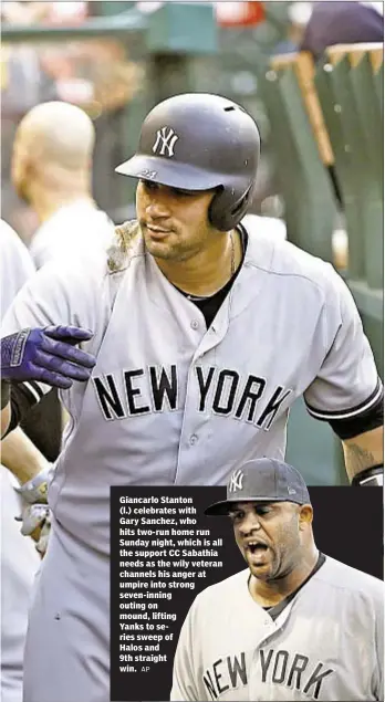  ?? AP ?? Giancarlo Stanton (l.) celebrates with Gary Sanchez, who hits two-run home run Sunday night, which is all the support CC Sabathia needs as the wily veteran channels his anger at umpire into strong seven-inning outing on mound, lifting Yanks to series...