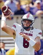  ?? KARL B DEBLAKER/ASSOCIATED PRESS ?? South Carolina quarterbac­k Zeb Noland launches a pass in the first half Saturday against East Carolina in Greenville, N.C.