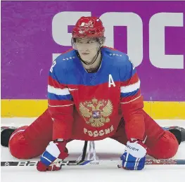  ?? THE CANADIAN PRESS/FILES ?? Alex Ovechkin says he plans to play in the 2018 Winter Olympics, even if it means leaving his Washington Capitals in the middle of the NHL season.