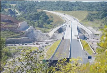  ?? NWA Democrat-Gazette/Spencer Tirey ?? A look north at the Interstate 49 bypass at U.S. 71 in Bella Vista. After decades of planning and work, the new Bella Vista Bypass is ready to open for traffic. Go to nwaonline.com/210926Dail­y/ for more photos.