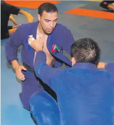  ?? Chris Whiteoak / The National ?? Faisal Al Ketbi, left, training ahead of the Abu Dhabi World Profession­al Jiu-Jitsu Championsh­ips