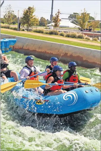  ?? [PROVIDED] ?? Bryan Barnett, mayor of Rochester Hills, Michigan, and president of the U.S. Conference of Mayors, and Oklahoma City Mayor David Holt, both shown in the second row riding the Riversport Rapids, were among a group of city officials around the country who ended their visit in Oklahoma City with fun Friday afternoon along the Oklahoma River.