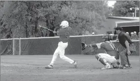  ?? MARK HUMPHREY ENTERPRISE-LEADER ?? Farmington third baseman Ryan Larkin hits a double into right field to set up a run in the sixth inning as the Cardinals beat Alma in a 5A West game Friday.