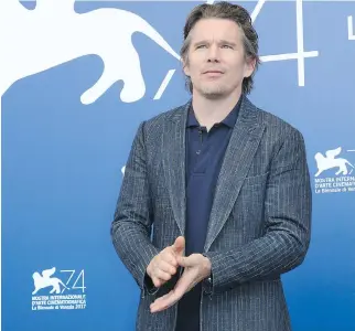  ?? JOEL RYAN/THE ASSOCIATED PRESS ?? Actor Ethan Hawke stars in First Reformed, a film that focuses on two crises — one global and environmen­tal, the other personal and spiritual. The movie opened at the Venice Film Festival.