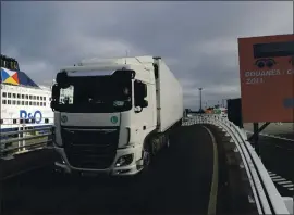  ?? LEWIS JOLY — THE ASSOCIATED PRESS ?? A lorry arrives Friday in Calais, France, to board the first ferry going to Britain after Brexit.