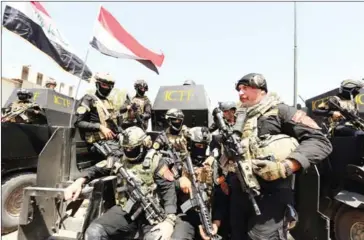  ?? SABAH ARAR/AFP ?? Members of the Golden Division, the special forces of the Iraqi counter-terrorism forces, take part in a training exercise in Baghdad on March 20 as they preparare for a future operation aimed at retaking the northern city of Mosul, which is Islamic...