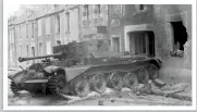  ?? ?? A British Cromwell Cruiser tank, knocked out during the Battle of Villers-bocage, lays abandoned in the streets