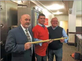 ?? NICHOLAS BUONANNO — NBUONANNO@TROYRECORD.COM ?? KeyBank on 3rd Street in Troy received this year’s Golden Stickball Bat award in advance of Sunday’s stickball tournament benefiting Joseph’s House and Shelter in Troy.
