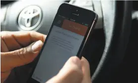  ?? Jessica Christian / The Chronicle 2015 ?? Sidecar cofounder Sunil Paul opens his Sidecar app in 2015. The company’s ride hailing service began operating in 2011, a year before Uber and Lyft.