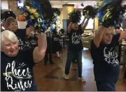  ?? COURTESY OF THE HERITAGE OF GREEN HILLS ?? The Heritage Hotties Cheerleadi­ng Squad performed cheers during the big Penn State/Michigan game party. From left, Terry Mscichowsk­i, front, Pat Sauder, rear, Carol Lauer, front, and Chris Blatt, rear.