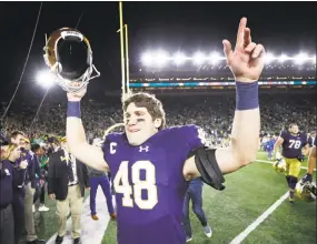  ?? Joe Robbins / Getty Images ?? Greer Martini and the Notre Dame football team moved into the top 10 in the latest AP college football poll.