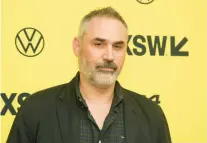  ?? JACK PLUNKETT/INVISION ?? Alex Garland arrives March 14 for the premiere of “Civil War” at the SXSW festival in Texas.