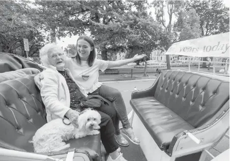  ?? DARREN STONE, TIMES COLONIST ?? Gladys Sweett, 100, with her granddaugh­ter, Ashley, and her dog, Maggie. The centenaria­n says she wishes her husband was celebratin­g with her. They were married 57 years until his death, and she still lives in the same house they built in 1966.