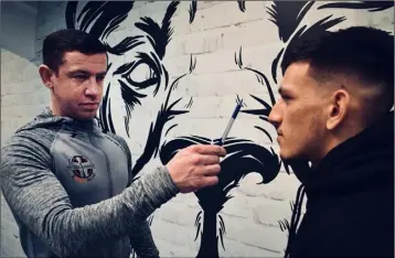  ??  ?? Lar Brennan working with fighters at the prestigiou­s SBG gym in Dublin.