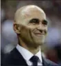  ?? MATTHIAS SCHRADER — THE ASSOCIATED PRESS ?? Belgium coach Roberto Martinez smiles as he waits for the start of the quarterfin­al against Brazil on July 5 in Kazan, Russia.