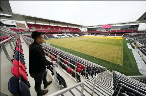  ?? AP PHOTO/JEFF ROBERSON ?? St. Louis City SC chief experience officer Matt Sebek looks out over the pitch inside CityPark Stadium Friday, Jan. 13, 2023, in St. Louis. When season tickets sales began for Major League Soccer’s newest team, St. Louis City SC leaders figured they’d be a hot ticket in a city with a deep love for the sport.