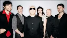  ?? Courtesy, Tim Cadiente ?? Maynard James Keenan, with glasses, says Puscifer “bumps” against predictabi­lity and has to be seen to be understood.